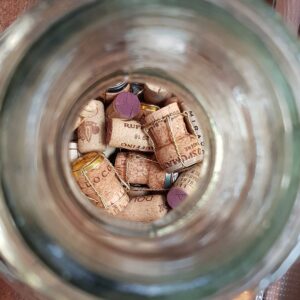 Wine corks through glass bottleneck closeup